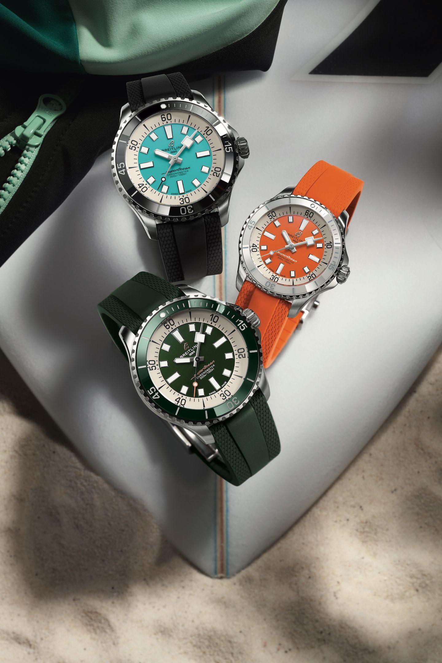 The new Breitling Superocean Collection_Ref. A17376211L2S1 (44 mm turquoise)_A17377211O1S1 (36 mm orange)_A17376A31L1S1 (44 mm green)