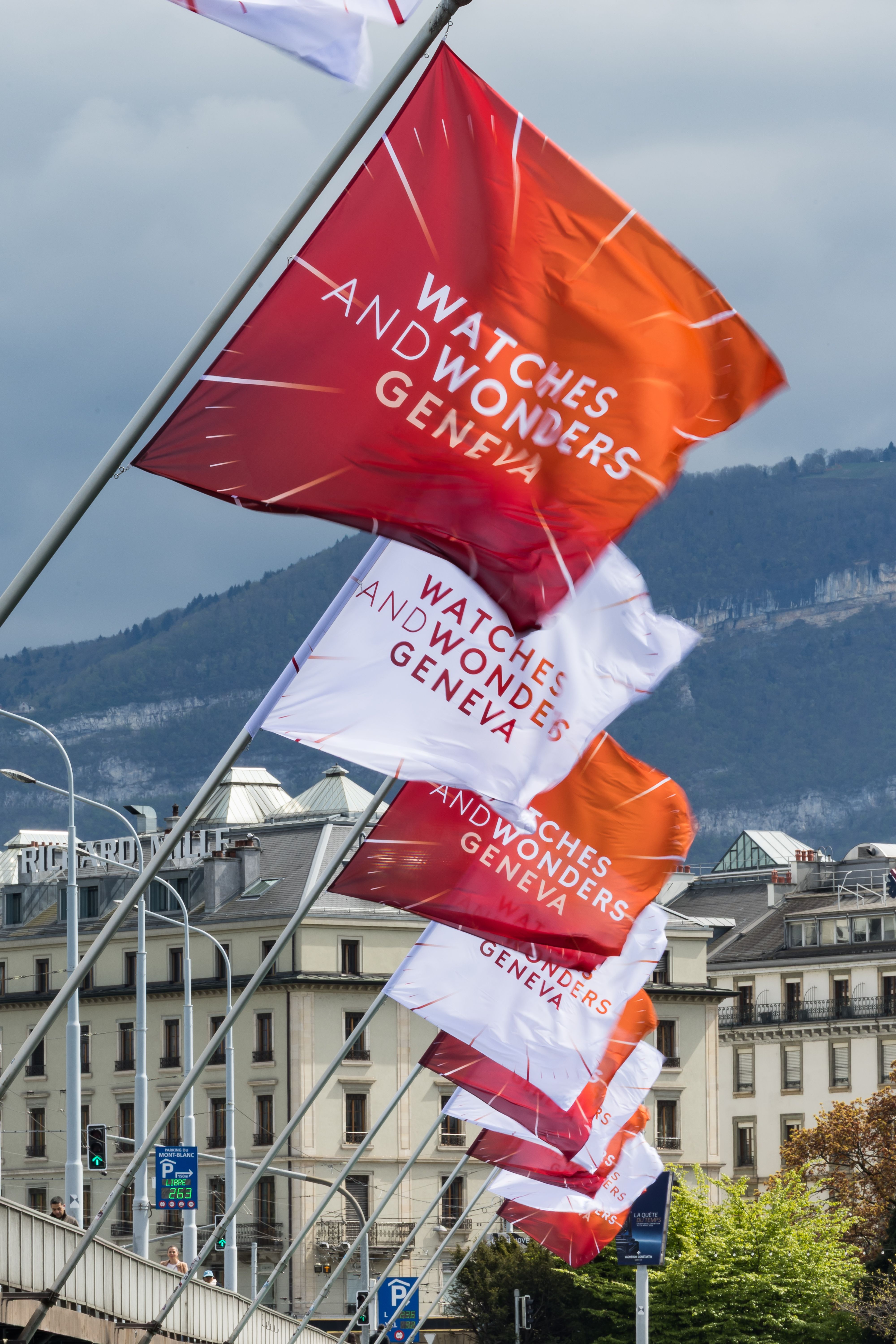 Watches & Wonders Geneva flags displayed across the city ahead of Watches & Wonders 2027, highlighting the world's leading luxury watch and Swiss watchmaking event in Geneva.