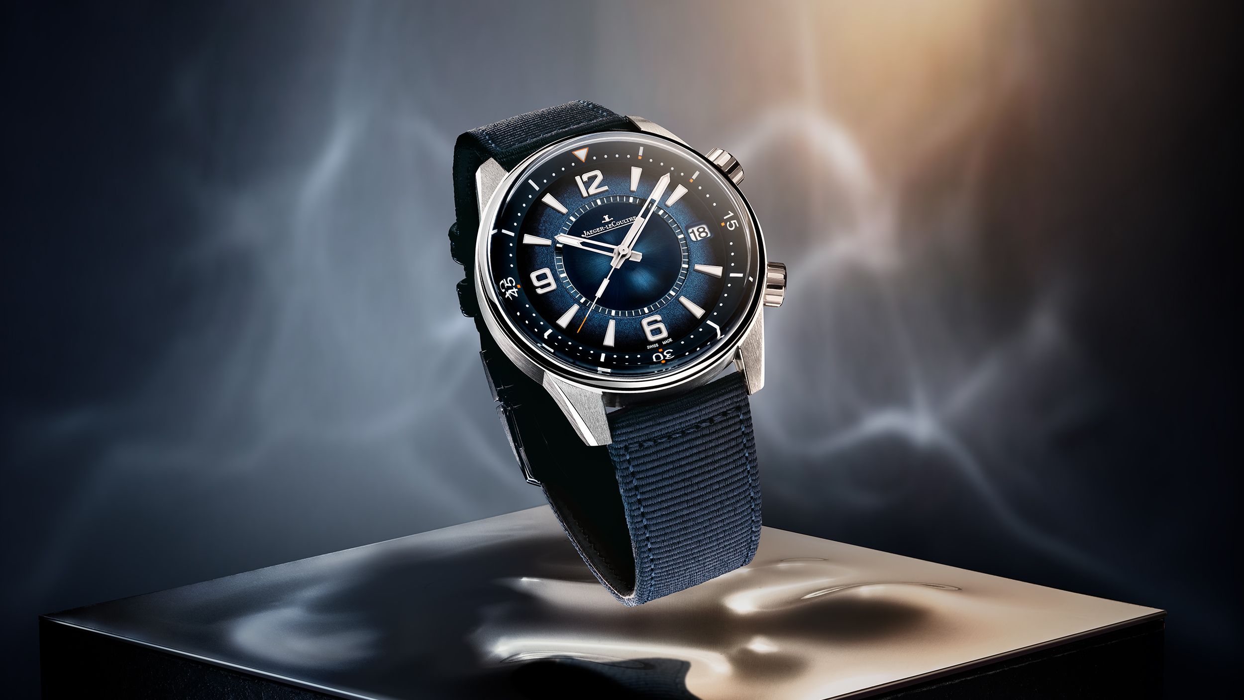 Jaeger-LeCoultre Polaris Date luxury sports watch with blue gradient dial and fabric strap, an ideal companion for Mumbai monsoon adventures