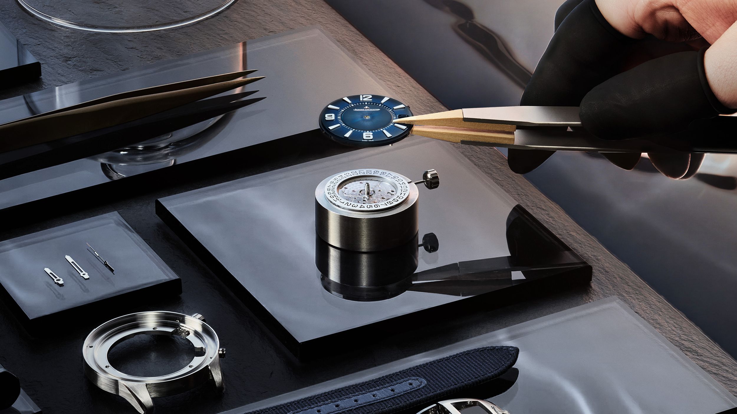 Jaeger-LeCoultre Polaris Date dial manufacturing process highlighting the craftsmanship behind the signature blue lacquered gradient dial
