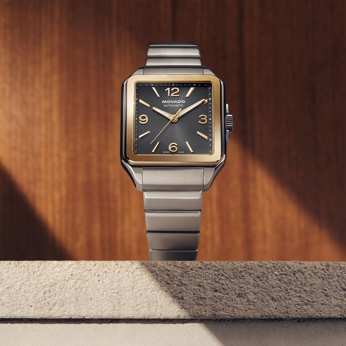 Movado Heritage 1917 automatic watch with square stainless steel case, gold-tone bezel and Art Deco-inspired dial design