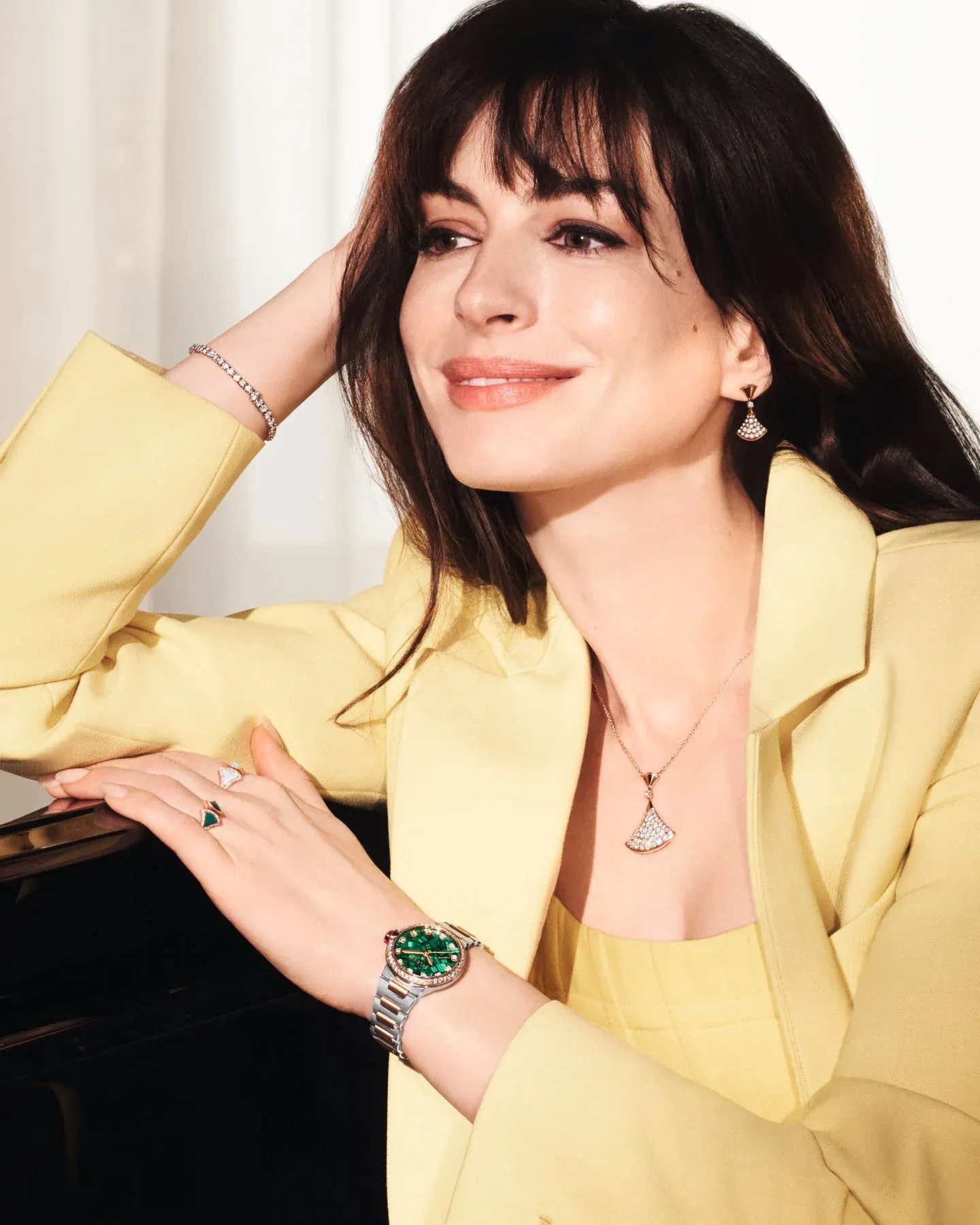 Anne Hathaway rocking the Bulgari Lucea intense malachite dial watch
