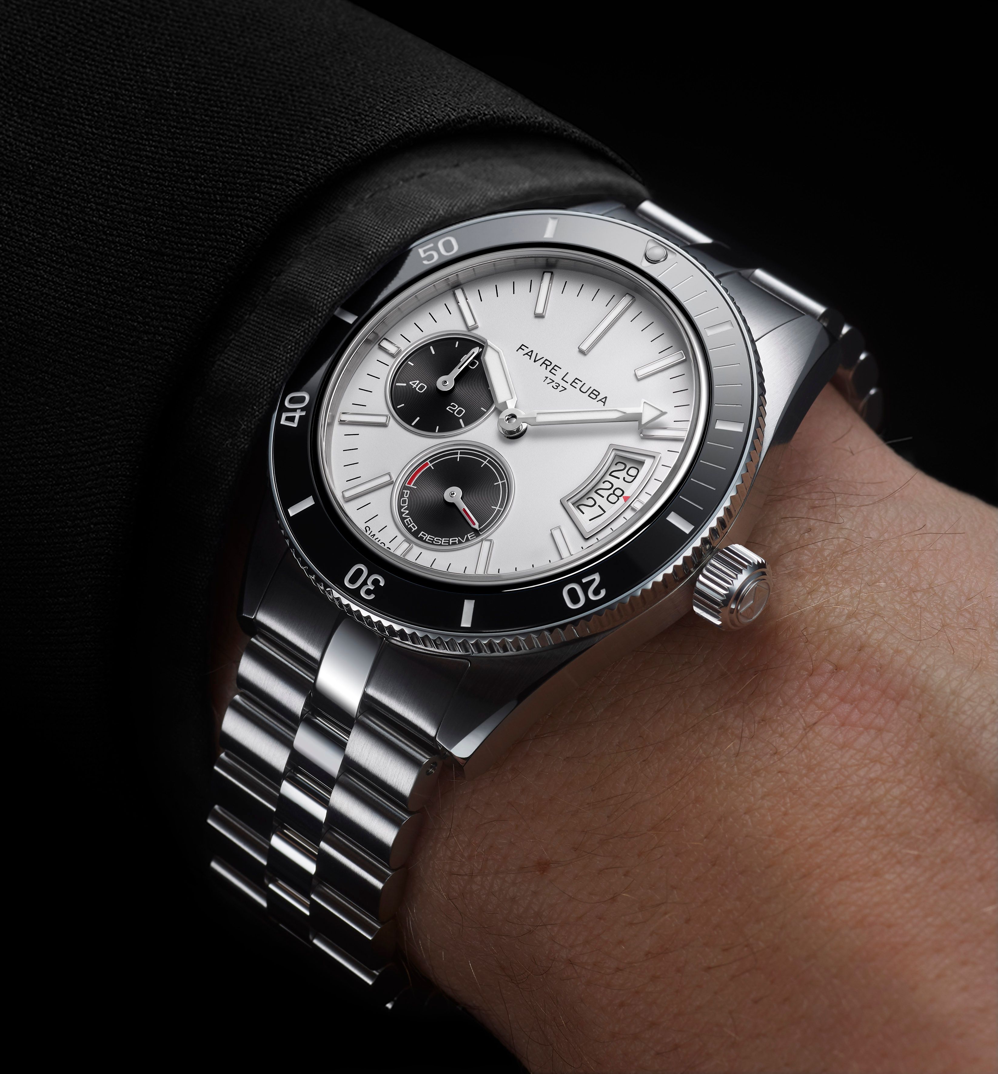 Favre Leuba Deep Raider Power Reserve white dial Swiss dive watch with stainless steel bracelet on wrist