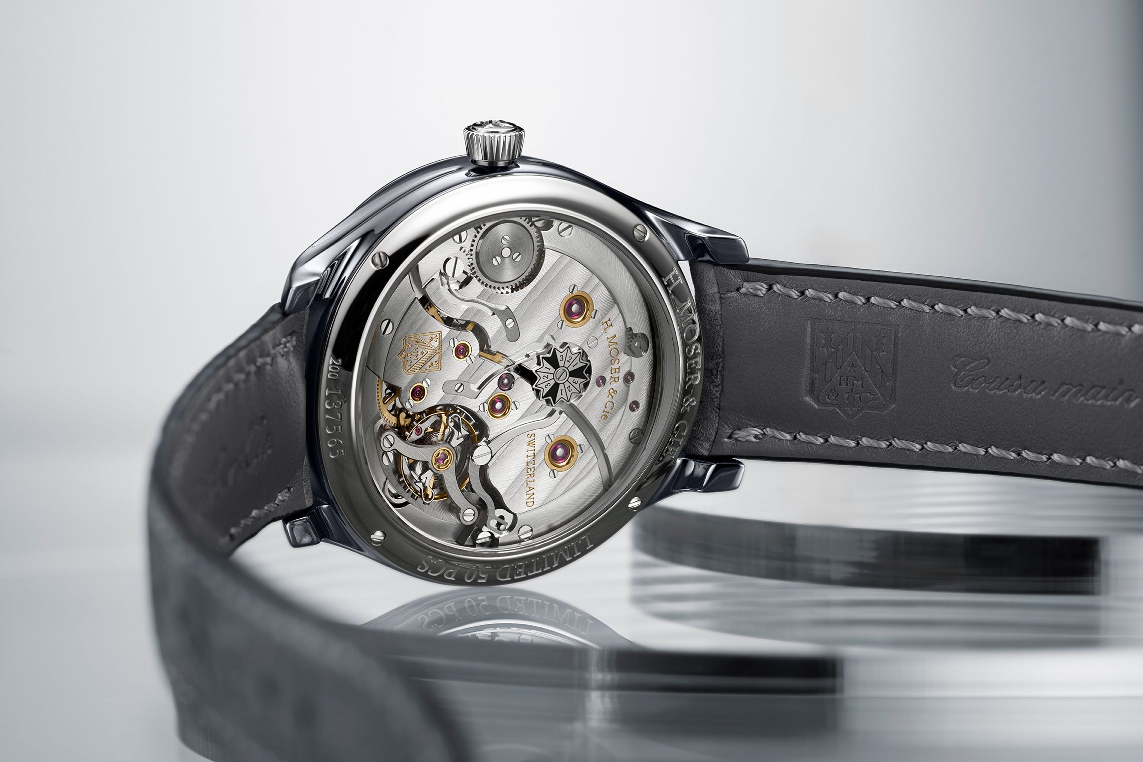 HMoser_1800-2004_Endeavour_Perpetual_Calendar_Tantalum__Lifestyle_Caseback.jpg