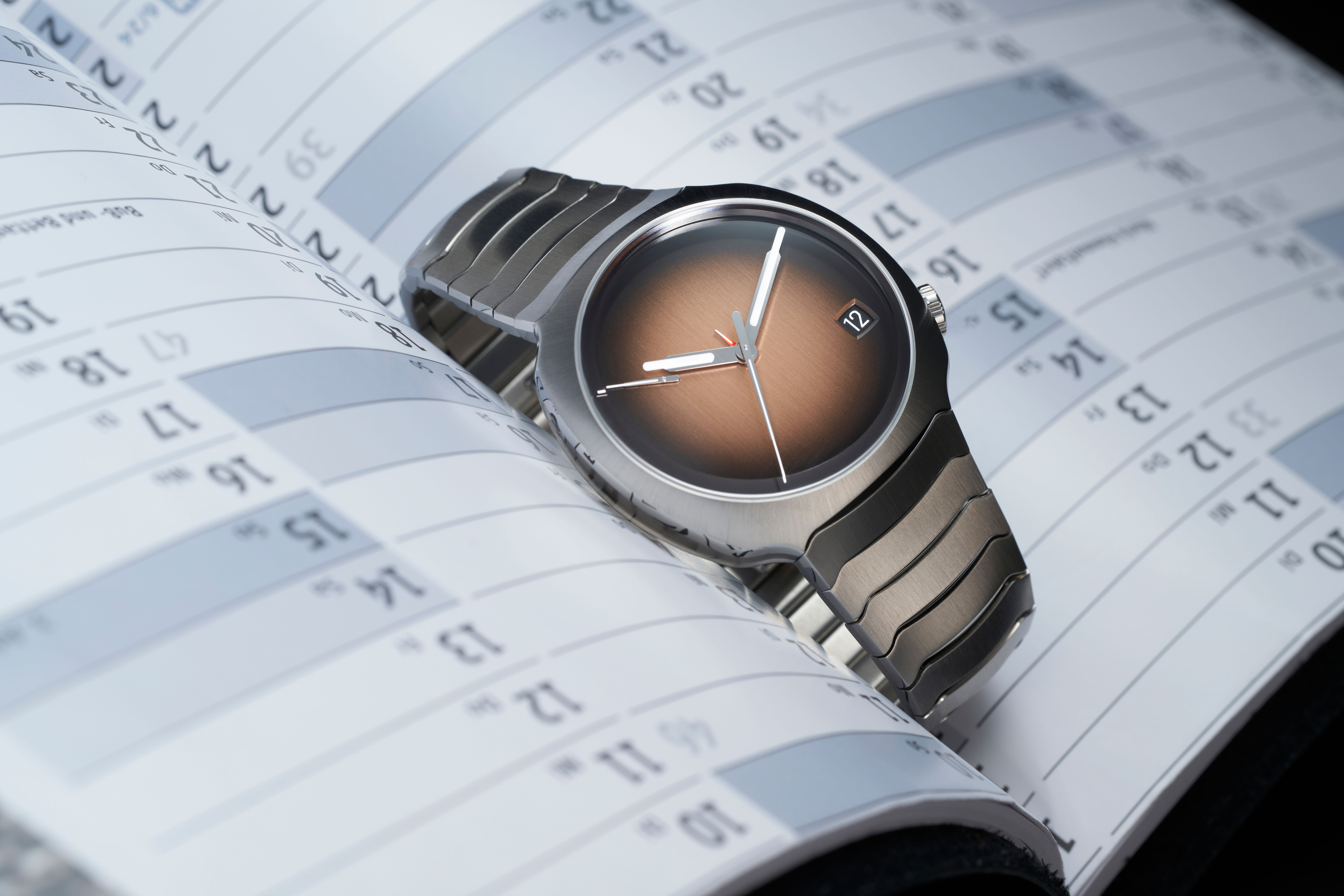 HMoser_6812-1201_Streamliner_Perpetual_Calendar_ST_SmokedSalmon__Lifestyle_calendar.jpg