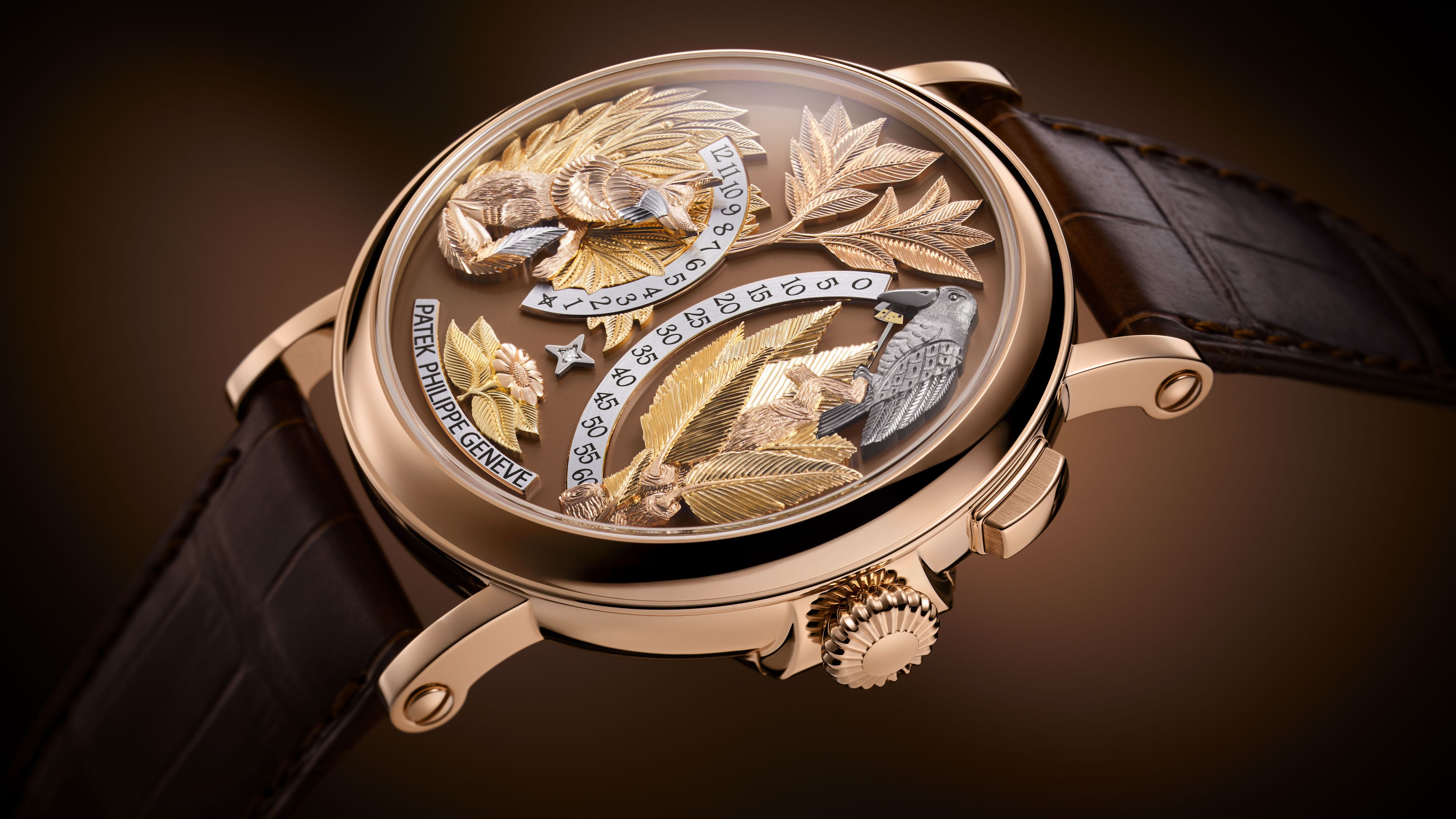 Patek Philippe Rare Handcrafts automaton watch with engraved bird motif and artistic gold dial