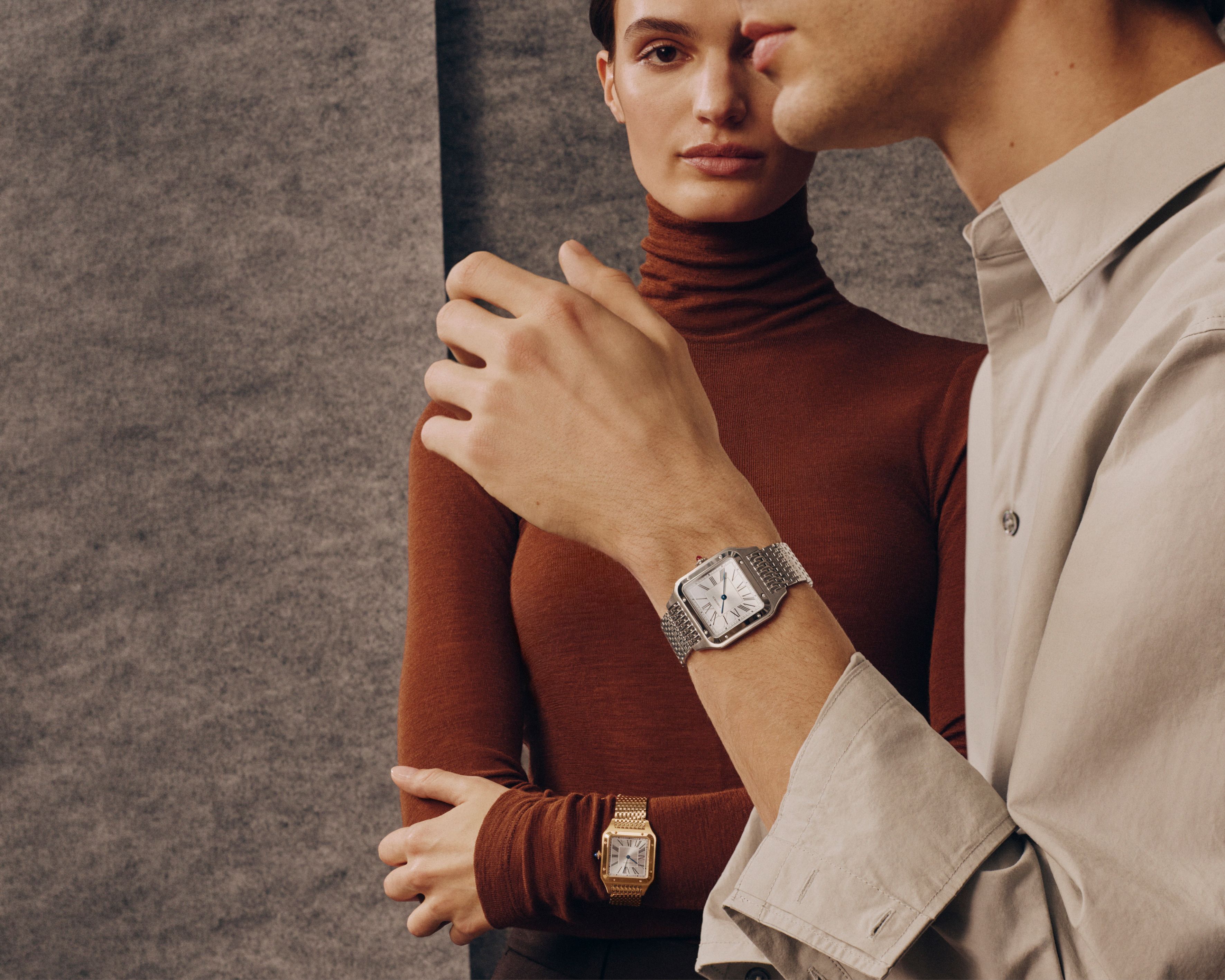 Cartier Santos Dumont watch on wrist showing elegant square case and metal bracelet fit