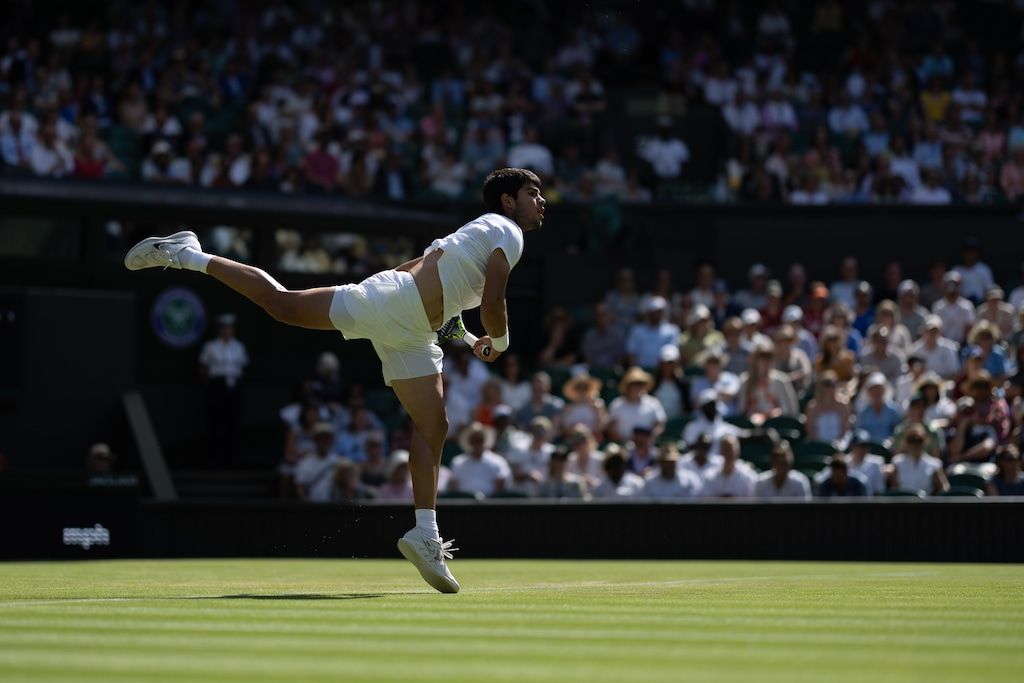 ROLEX TESTIMONEE AND THREE-TIME GRAND SLAMR CHAMPION CARLOS ALCARAZ HITS A SERVE EN ROUTE TO VICTORY AT THE CHAMPIONSHIPS, WIMBLEDON, 2023, Credits - Rolex Antoin Couver.jpg