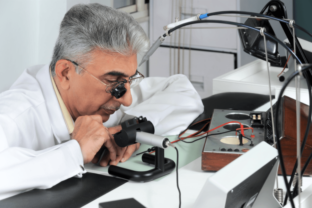 Mr. Cawas Pundole Examining a watch