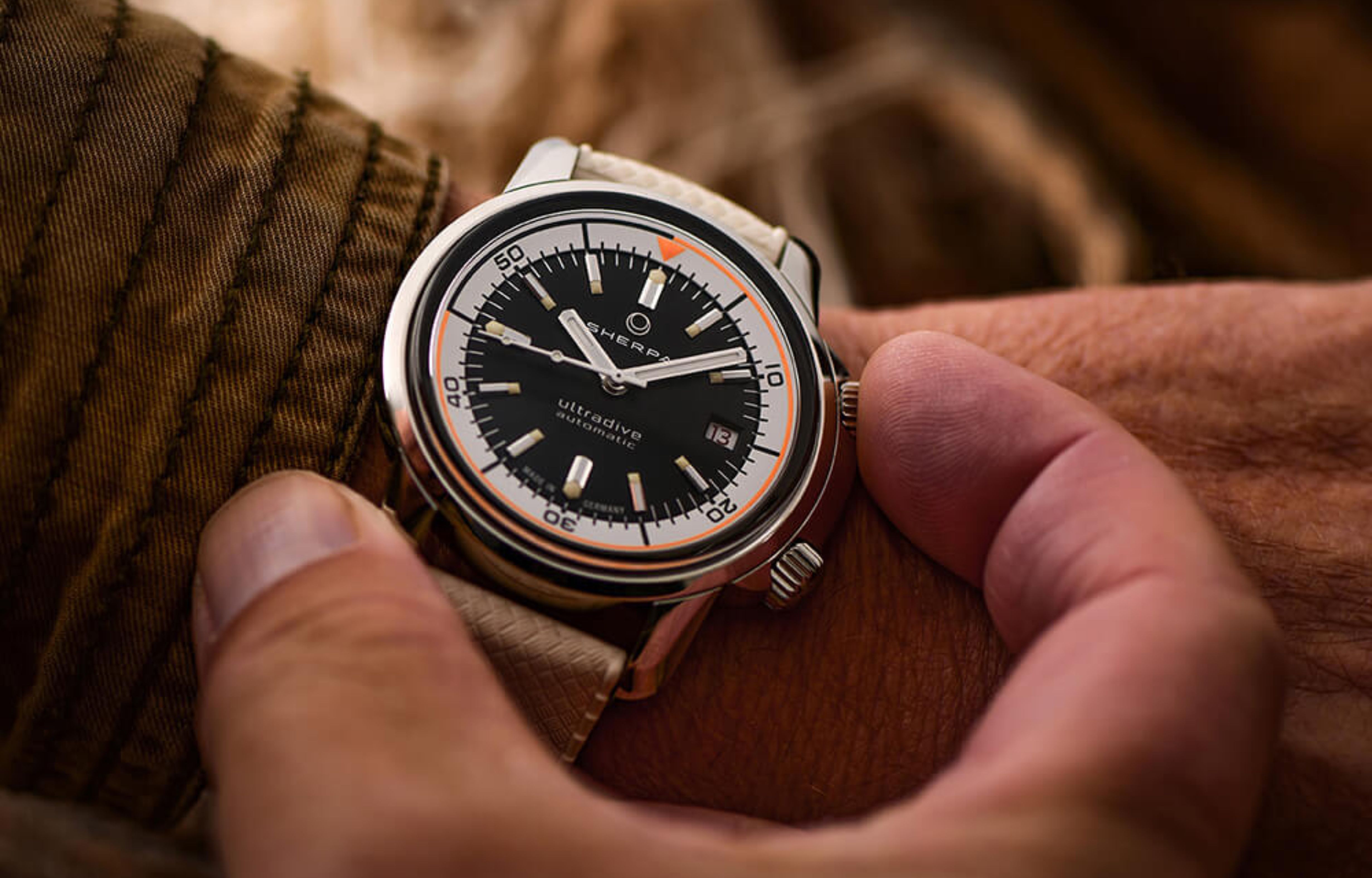 Sherpa Ultradive dive watch inspired by vintage Enicar compressor watches with modern Swiss engineering