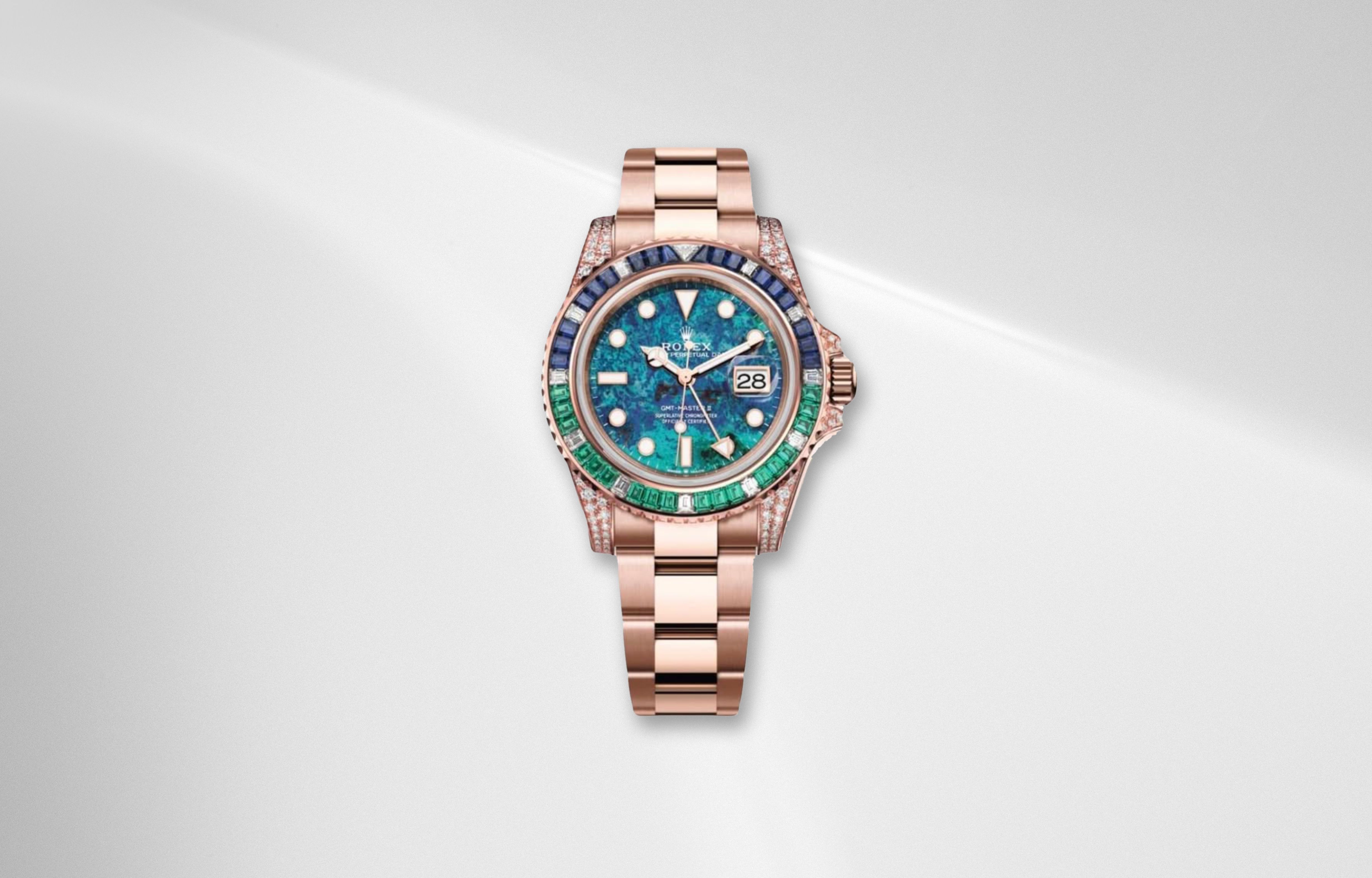 Rolex GMT Master II chrysocolla dial in Everose gold with sapphire emerald bezel off catalog luxury watch