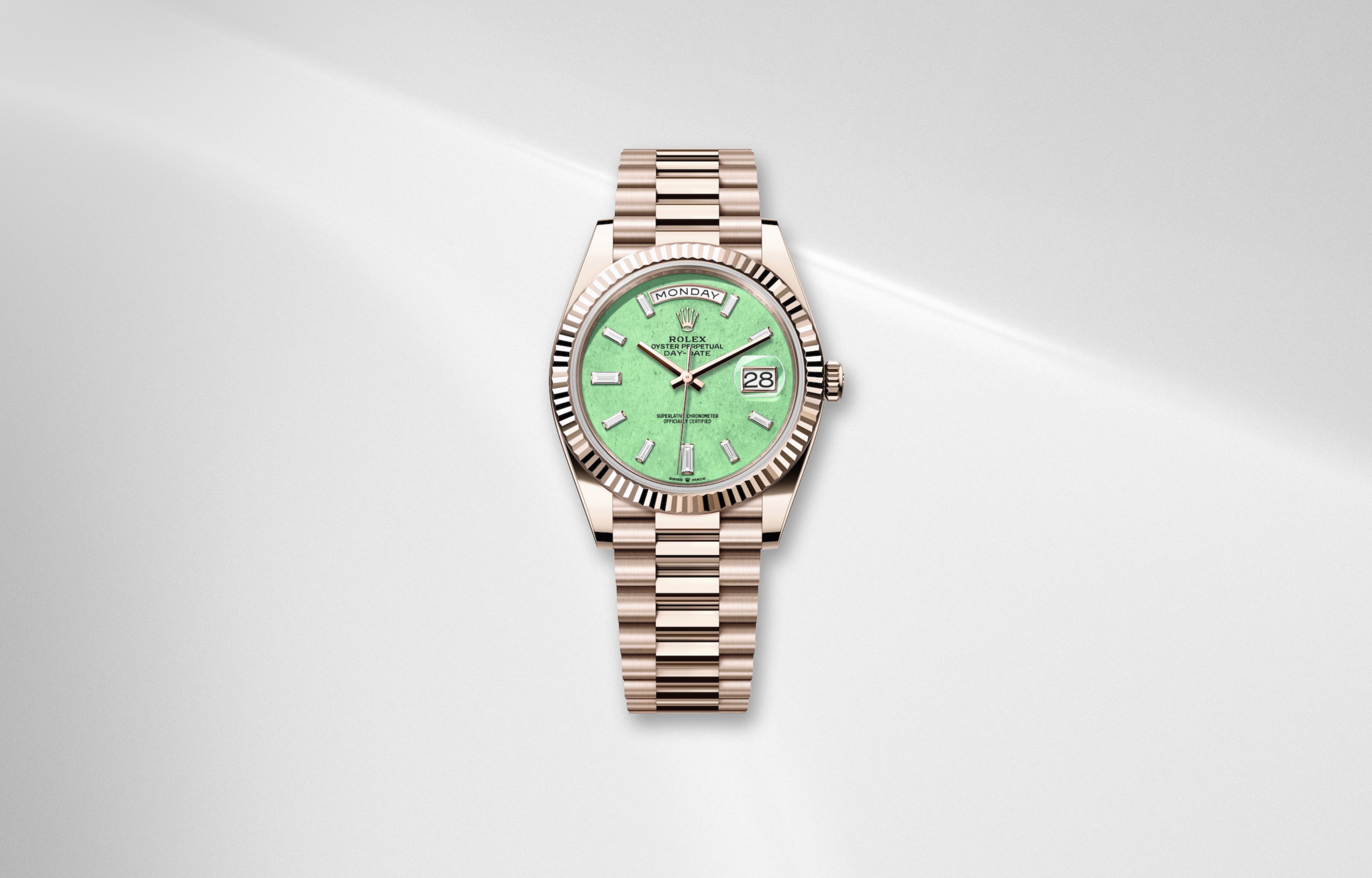 Rolex Day Date 40 matcha green dial in Jubilee gold with diamond hour markers luxury watch