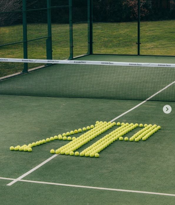 Padel balls arranged into the Audemars Piguet logo on a professional padel court highlighting AP’s entry into padel