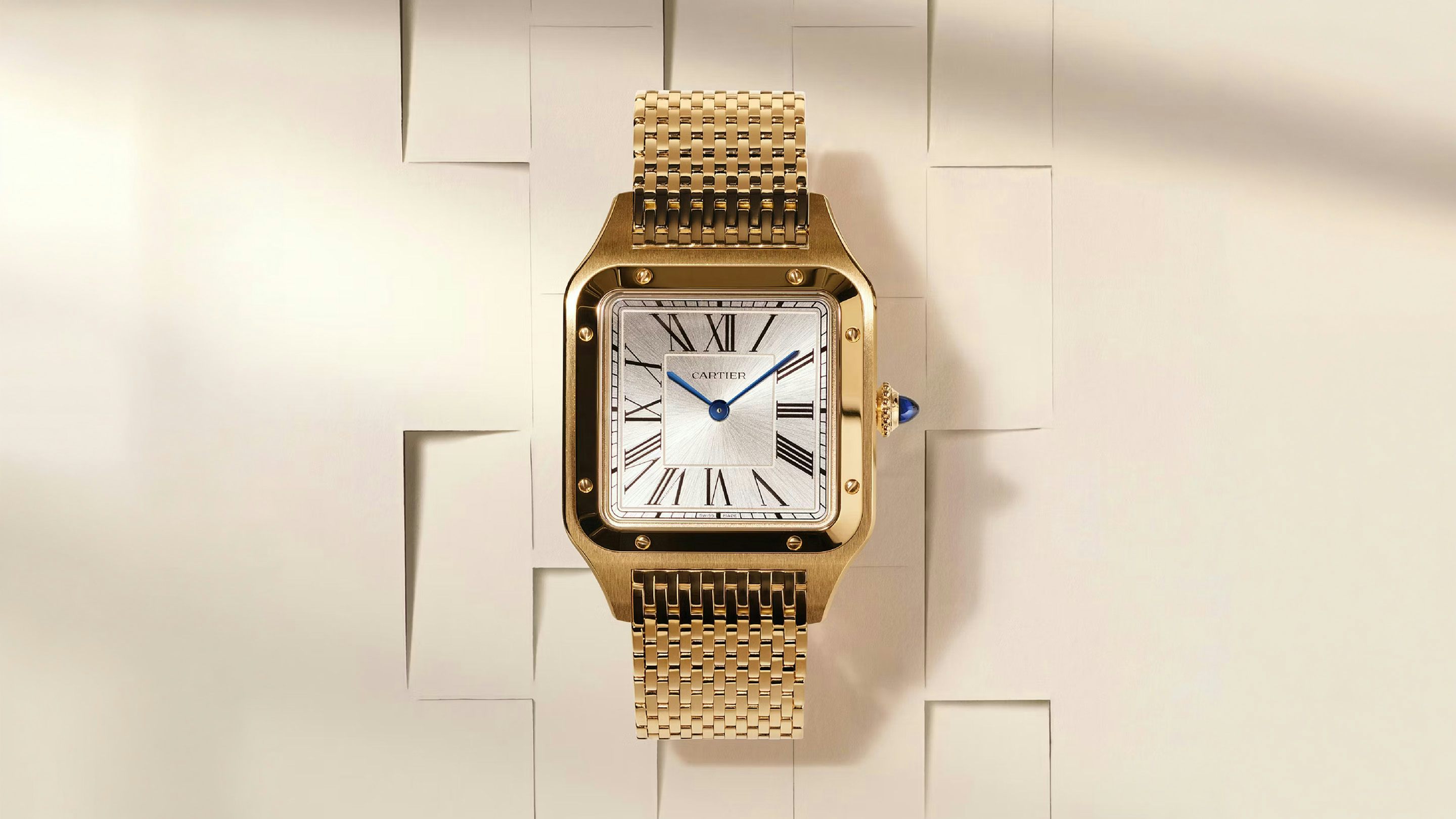 Cartier Santos Dumont gold watch with 15 row mesh bracelet showcasing refined craftsmanship at Watches And Wonders 2026