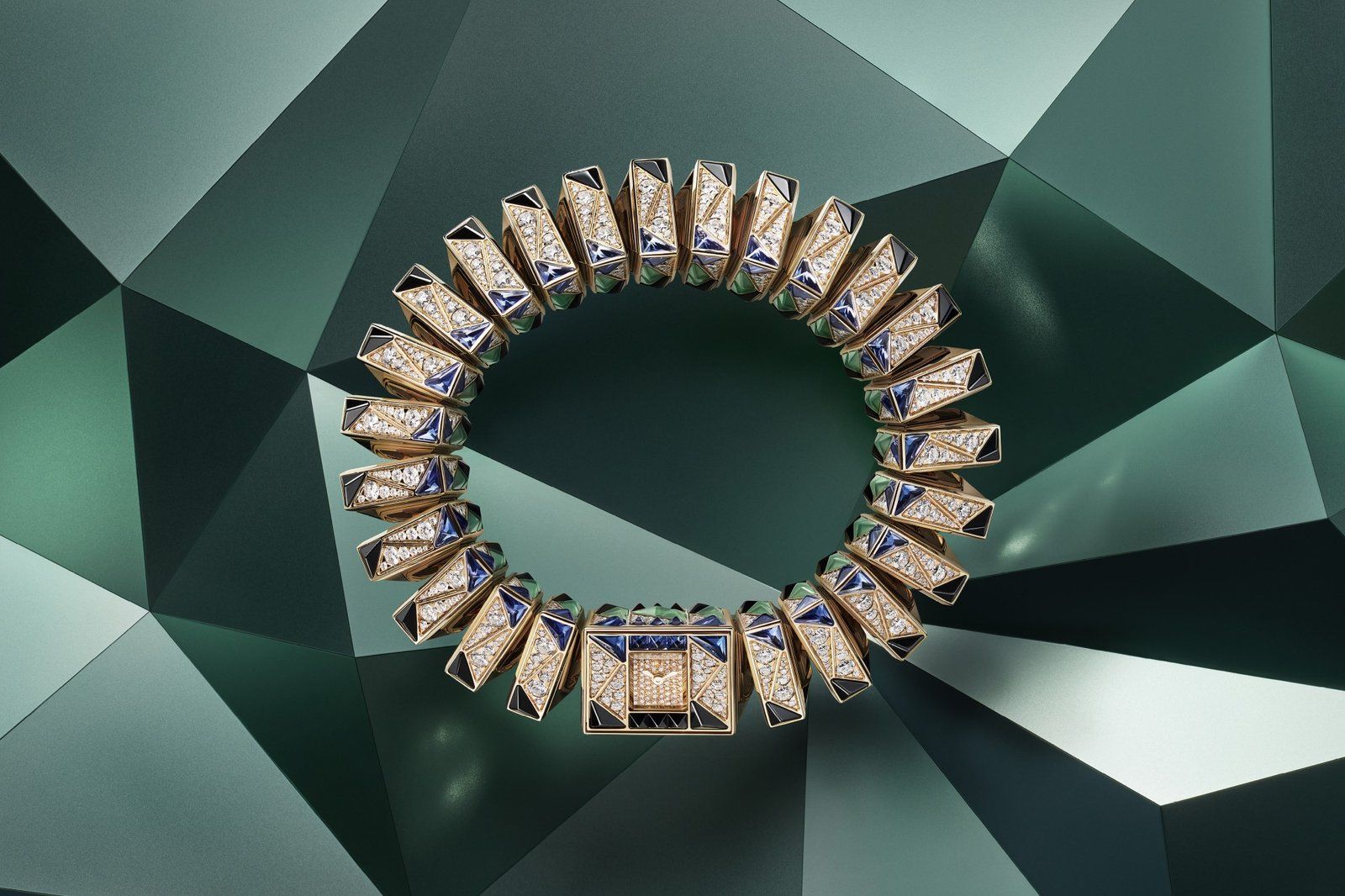 Cartier Libre featuring rose gold, black spinels, sapphires, emeralds, and diamonds