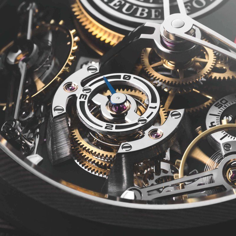 The watch's caliber features two balance wheels arranged side by side and inclined at 30°