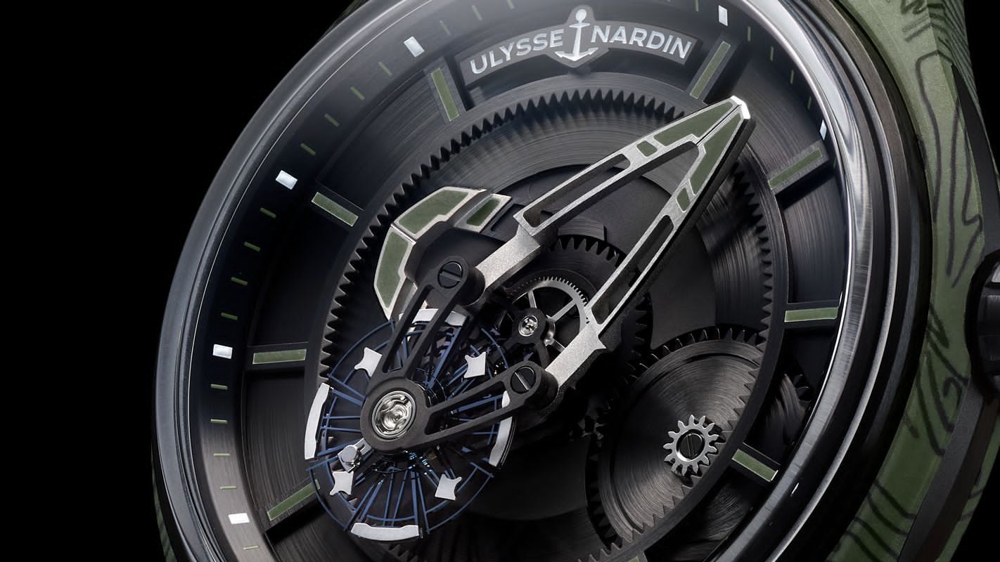 The detailed dial and striking khaki green carbon fiber flanks