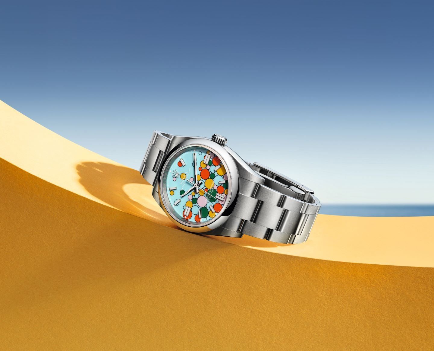 The watch features an Oystersteel bracelet with a folding Oysterclasp and Easylink extension