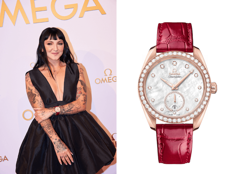 Julia Michaels chose the Seamaster Aqua Terra in 18K Sedna™ Gold, with diamond-paved bezel and red leather strap. 