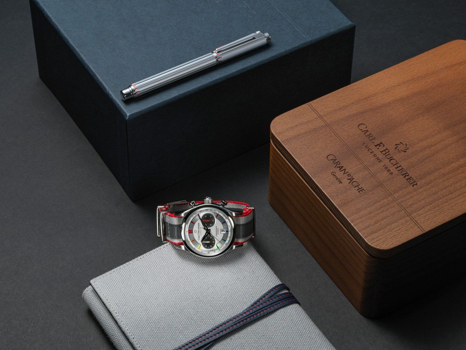 Carl F. Bucherer Manero Flyback Signature watch and the Caran d'Ache Signature rollerball pen.