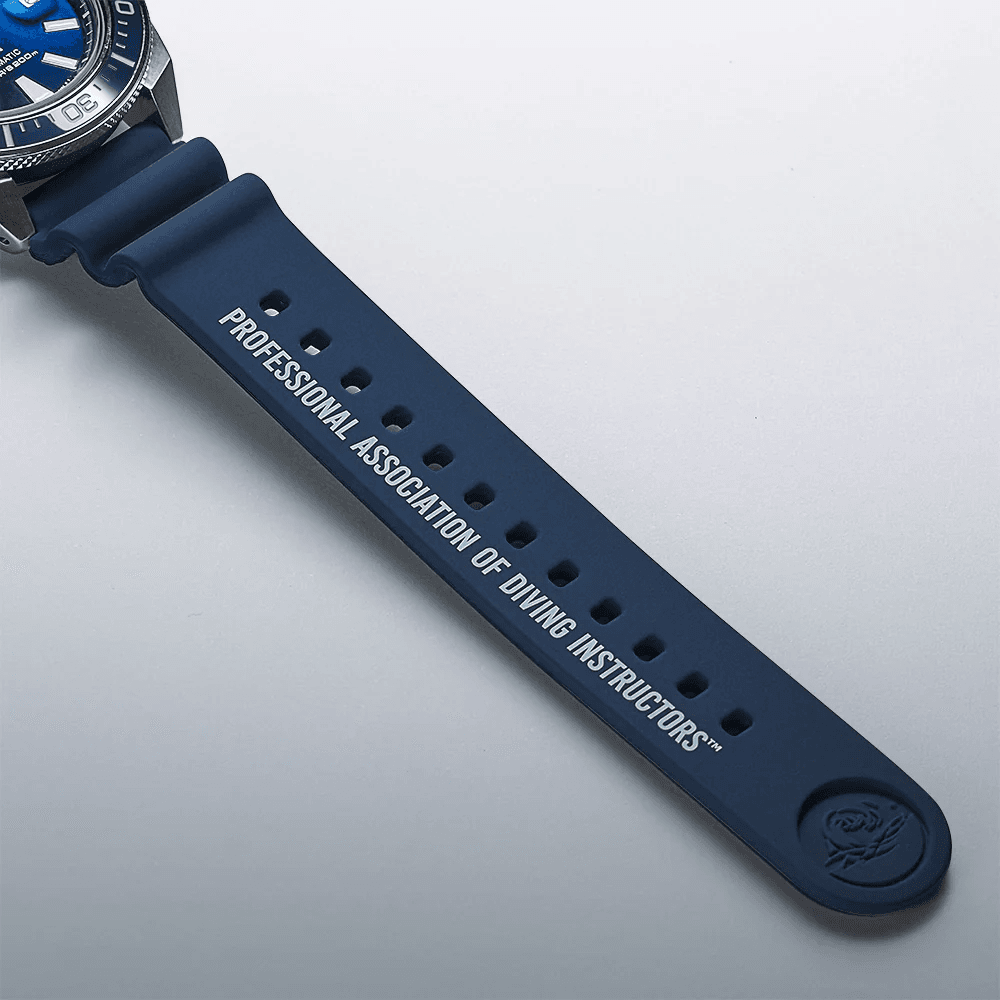 Professional Association of Diving Instructors is printed on the silicone strap.