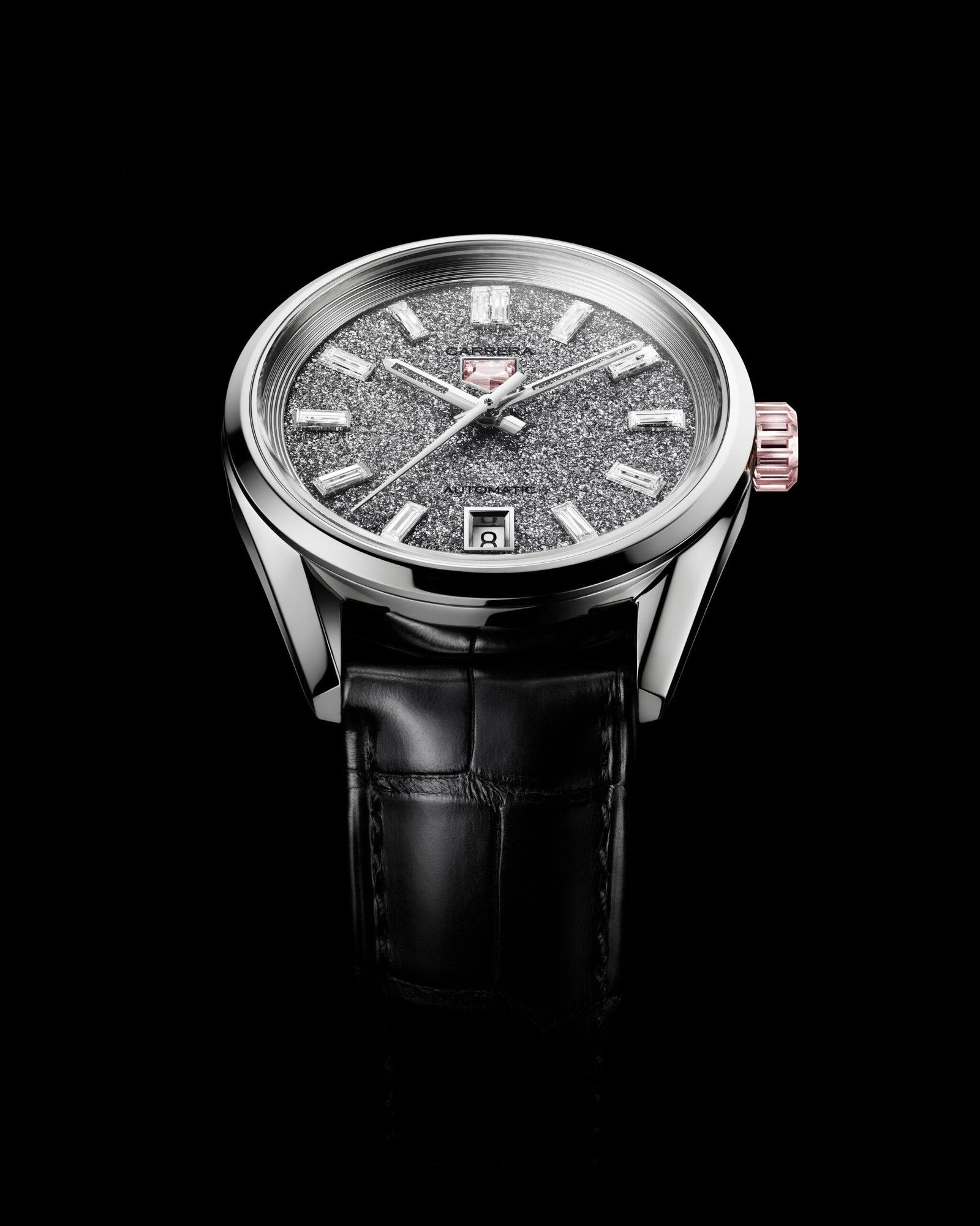 The watch features a 36mm white gold case with a 2.9-carat dial design