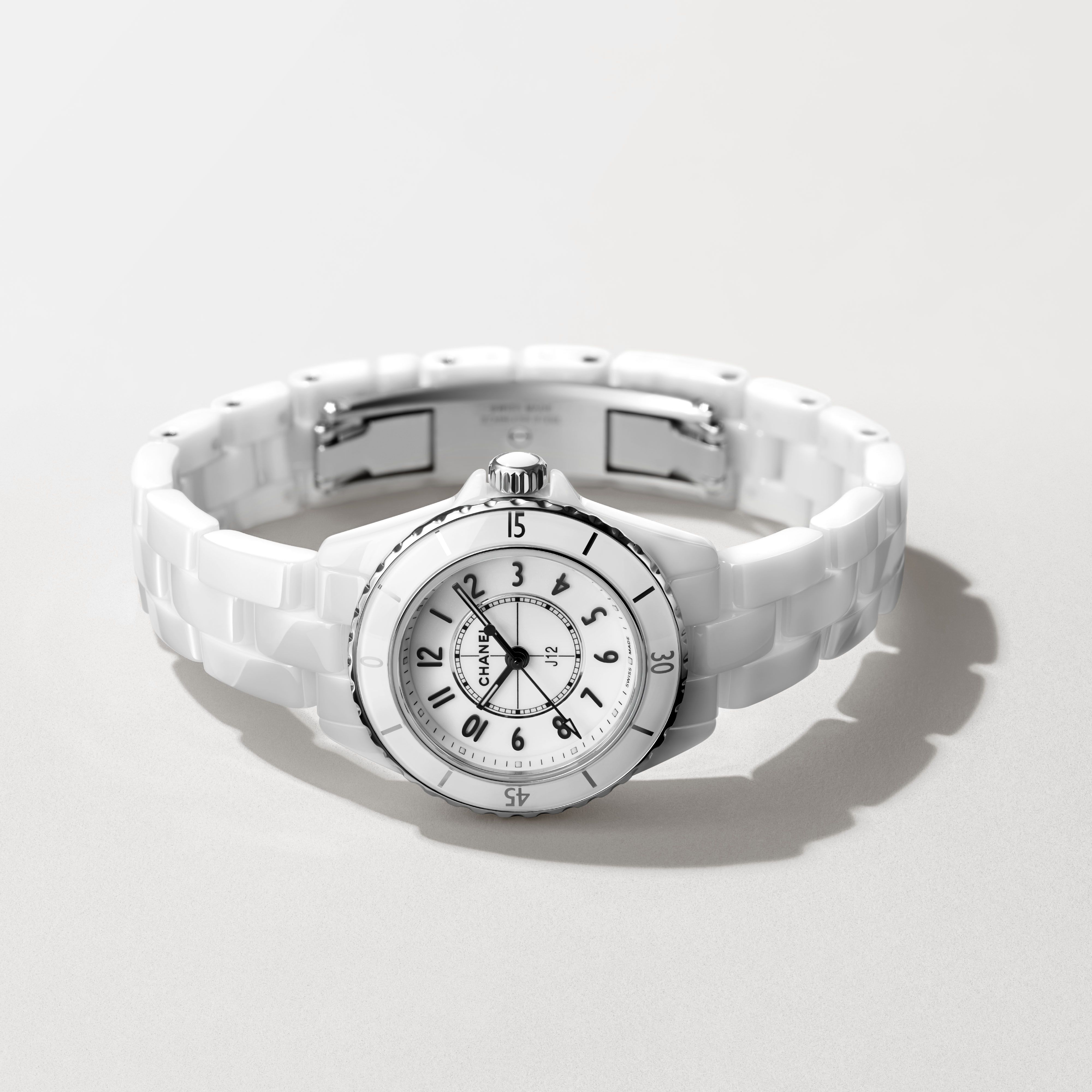 Chanel J12 28mm white ceramic watch with monochrome dial and matching bracelet design