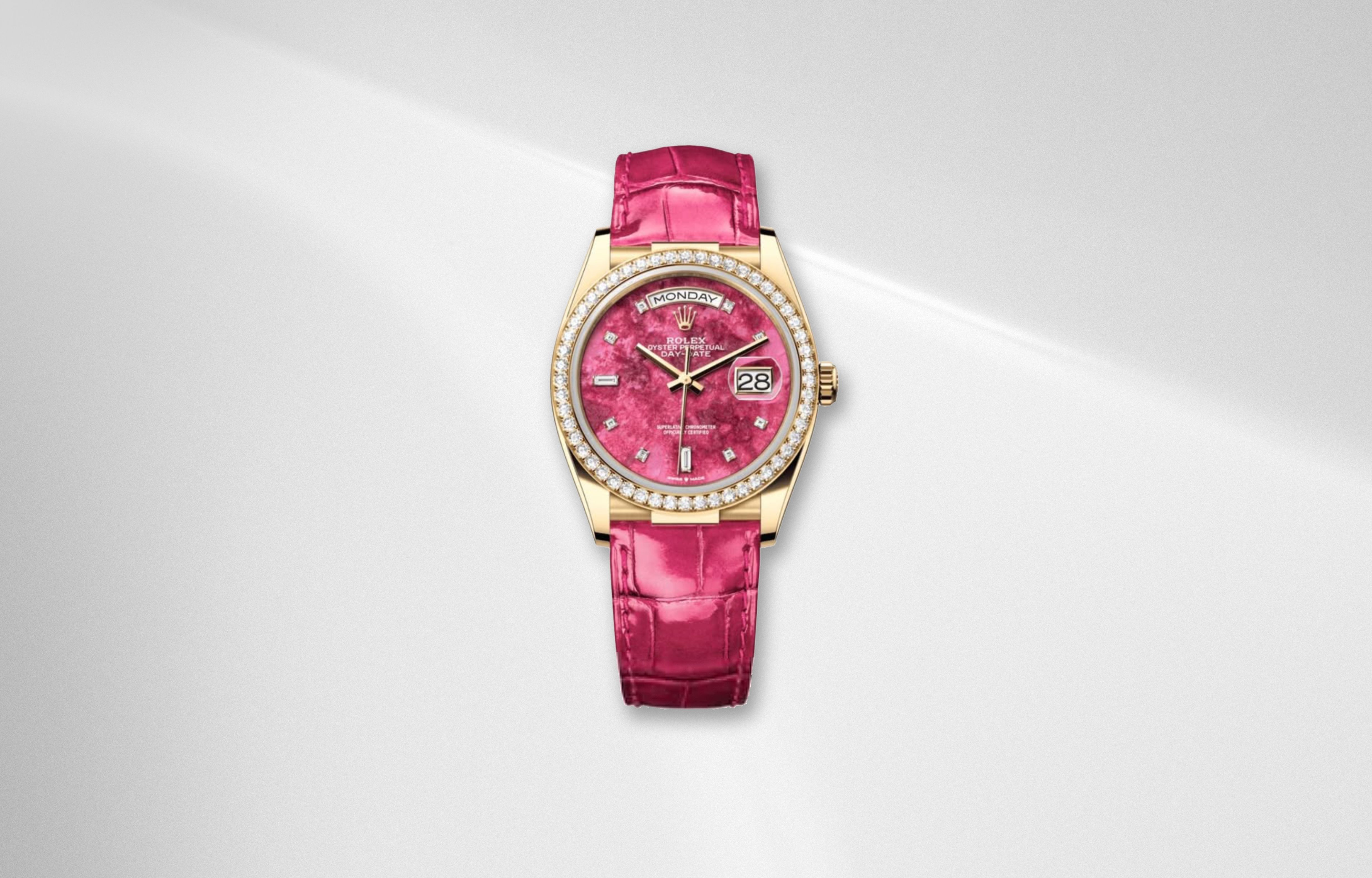 Rolex Day Date 36 pink thulite dial with diamond bezel and matching pink alligator strap