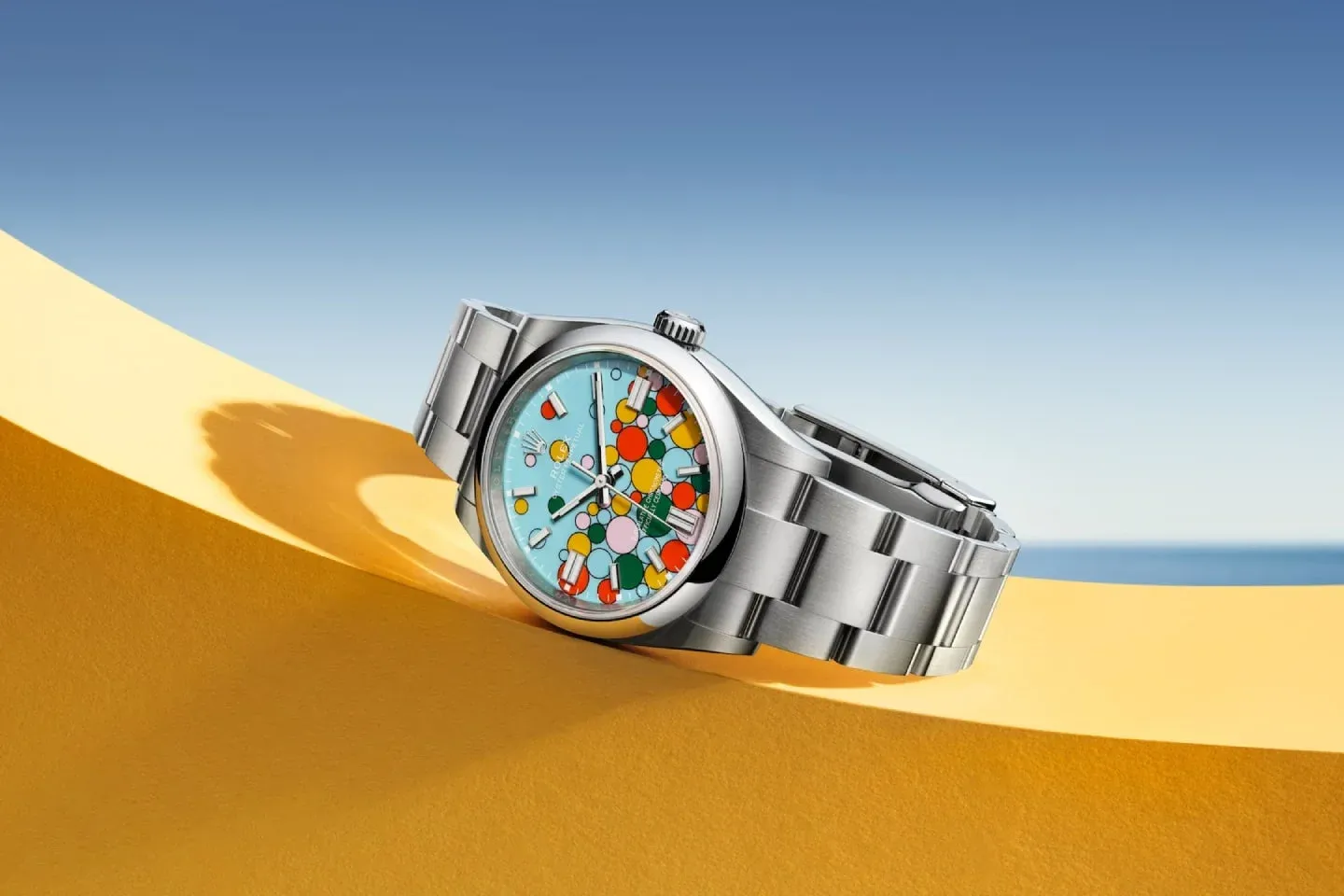 Colored dials have been making headlines in 2023. Releases like the Rolex Oyster Perpetual which featured a ‘Celebration Motif’ dial dotted with many coloured bubbles were a surprise